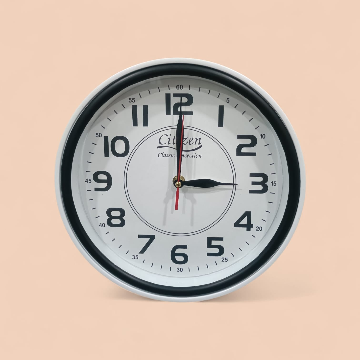 Elegant Round Plastic Wall Clock (613) with Modern Design